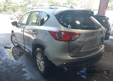 2014 Mazda Cx-5 Touring z USA, uszkodzony, nr VIN JM3KE2CY7E0317859